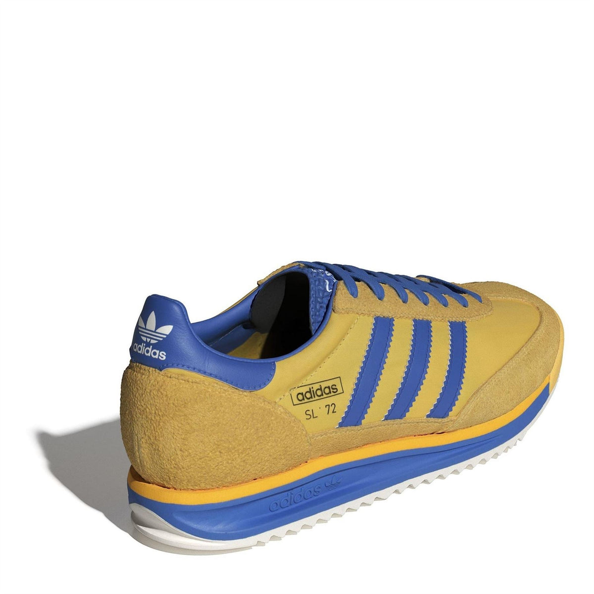 adidas Originals low top sneakers, gold with blue heel tab and Three Stripes, rear view