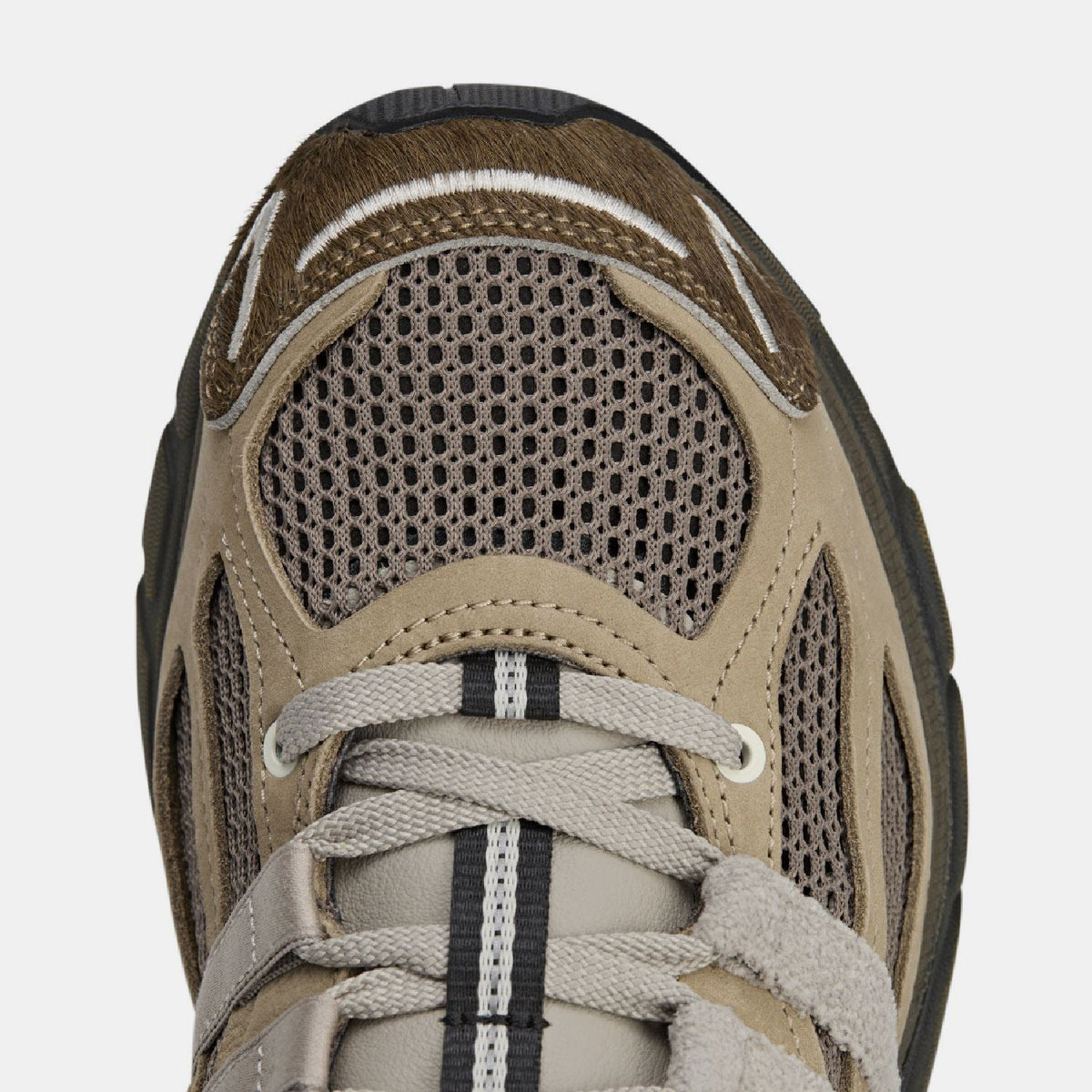 adidas Originals Adistar Cushion STFM trainers showing white and black athletic footwear with cushioned soles and stylish design