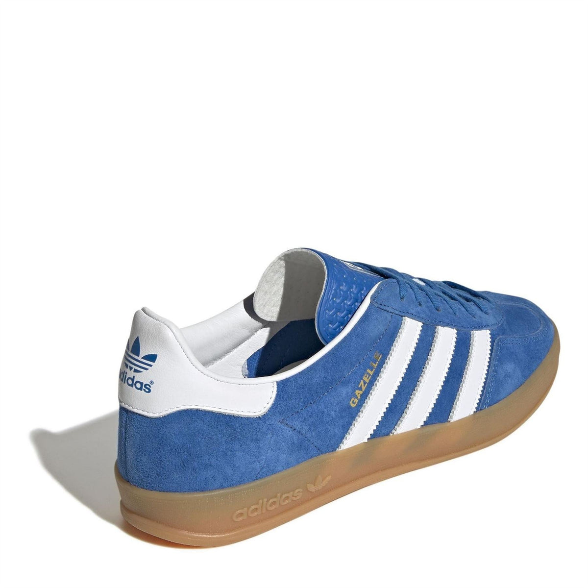 Blue suede sneaker with white collar lining, three stripes, and gum rubber sole