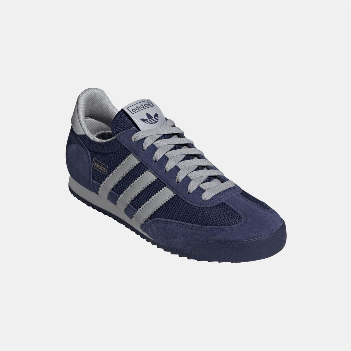 adidas Originals footwear showing stylish sneakers with classic design and white laces on a clean background