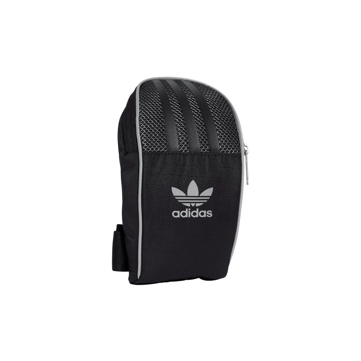 Black adidas small item bag, top zip and side pocket, trefoil logo on front.