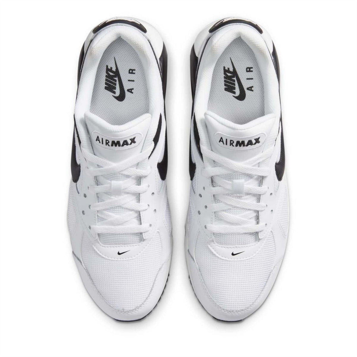 White Nike Air Max Ivo trainers with black accents, top view of laces and tongue branding