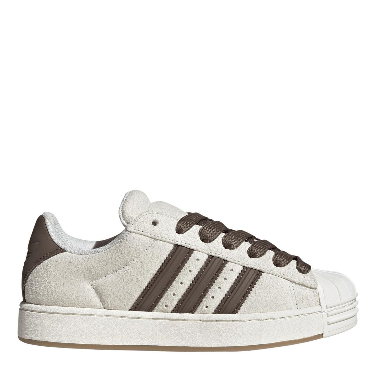 Off-white low-top sneakers with brown three stripes and lace-up front, rubber shell toe.