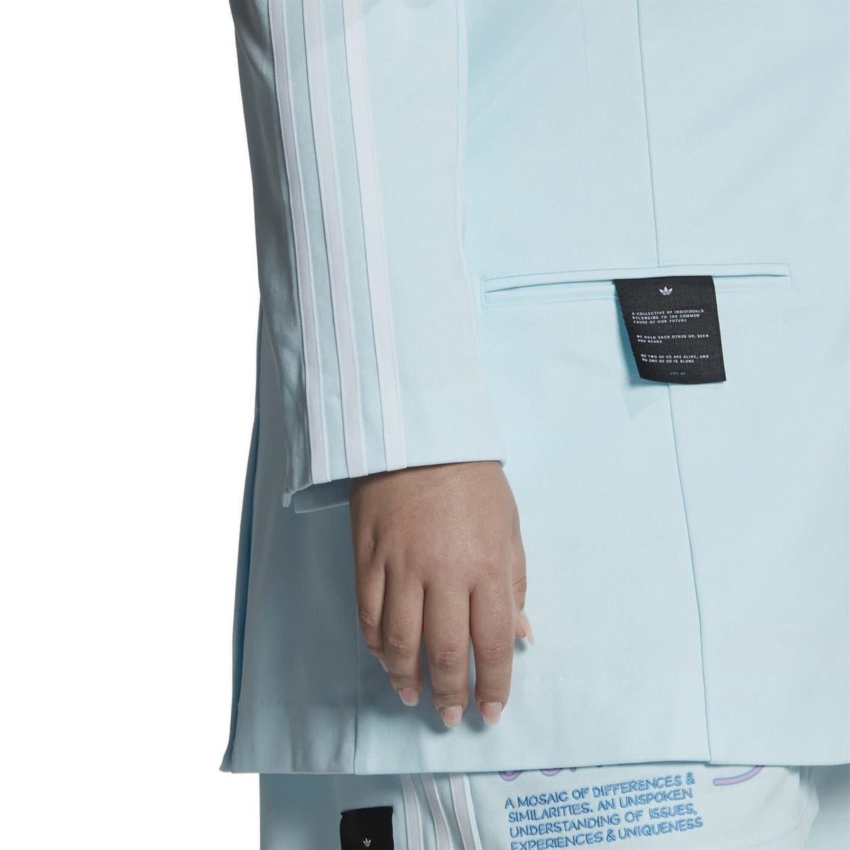 adidas Originals women's blazer coat with a stylish fit, featuring classic design and comfortable fabric for casual wear