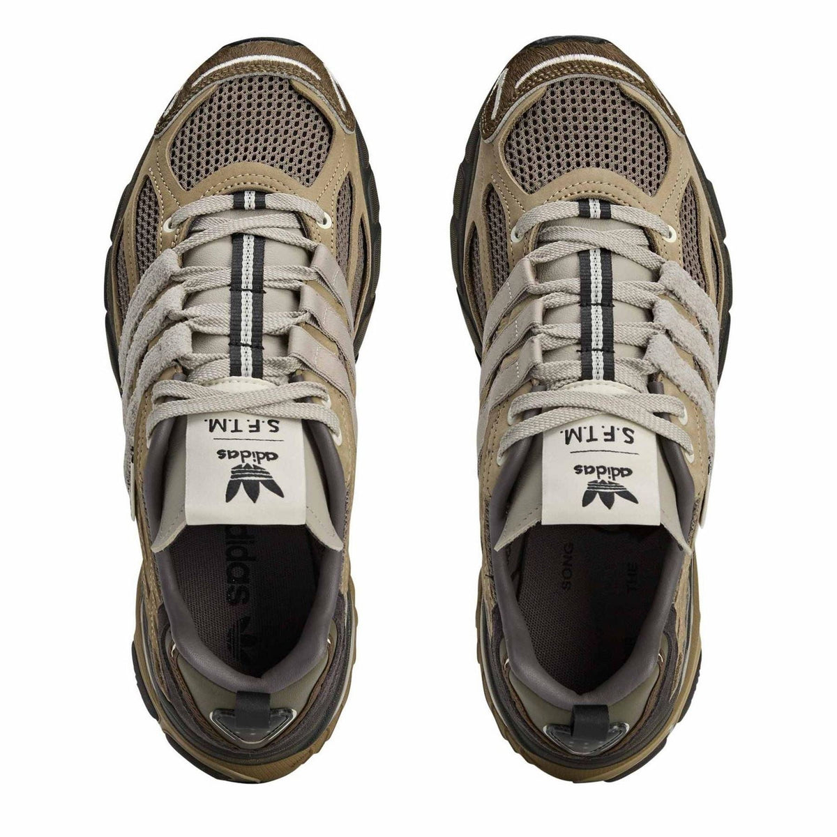 adidas Originals Cushion STFM trainers showing a stylish pair of athletic footwear with cushioned soles and modern design.