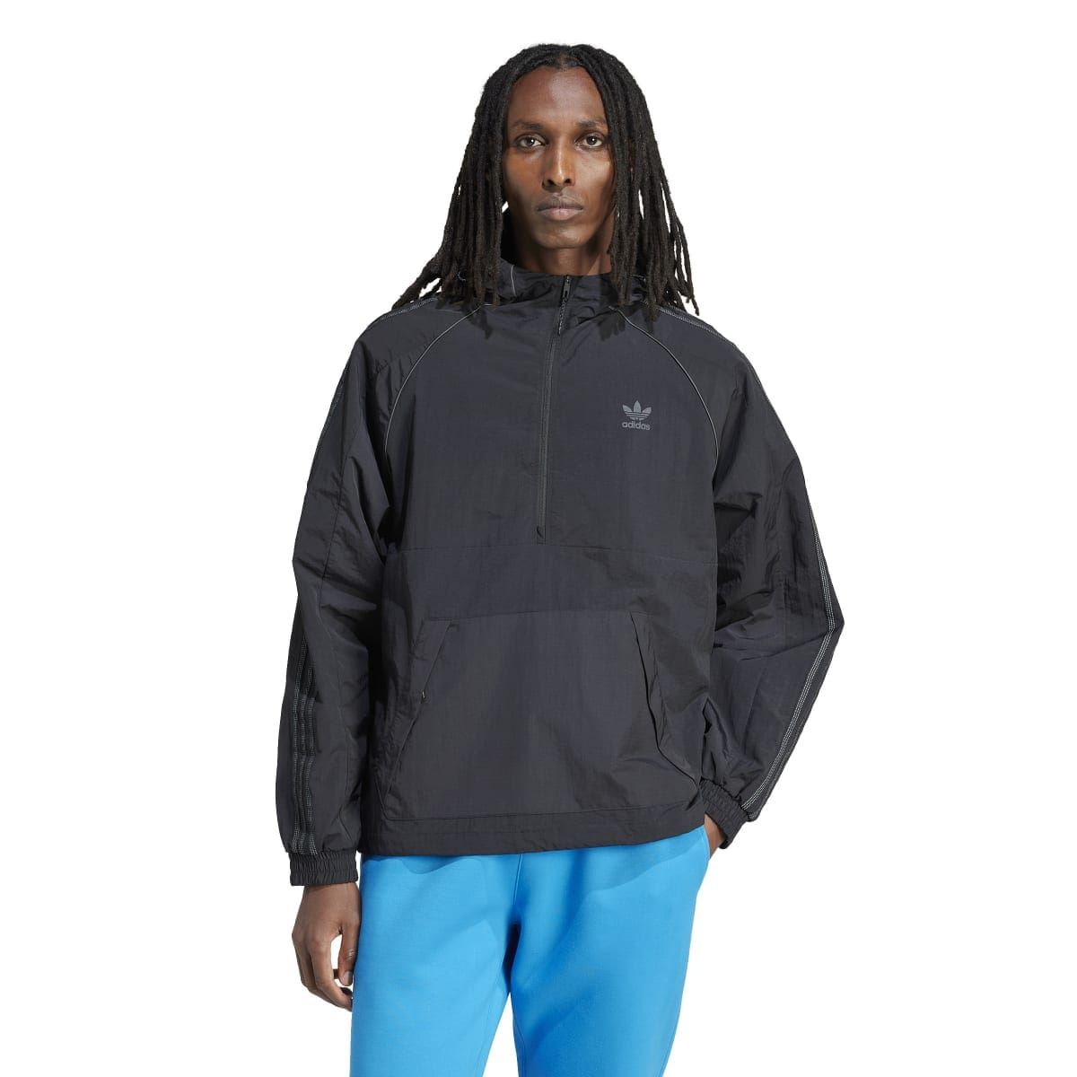 Black adidas anorak jacket worn over blue pants; hooded pullover with front zip