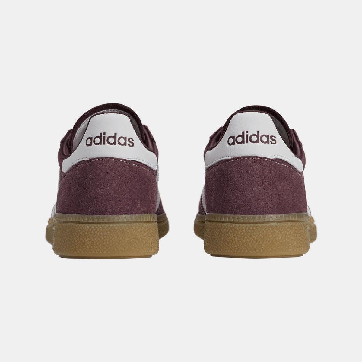 Burgundy adidas Spezial trainers, rear view with adidas branding, suede heel, gum sole