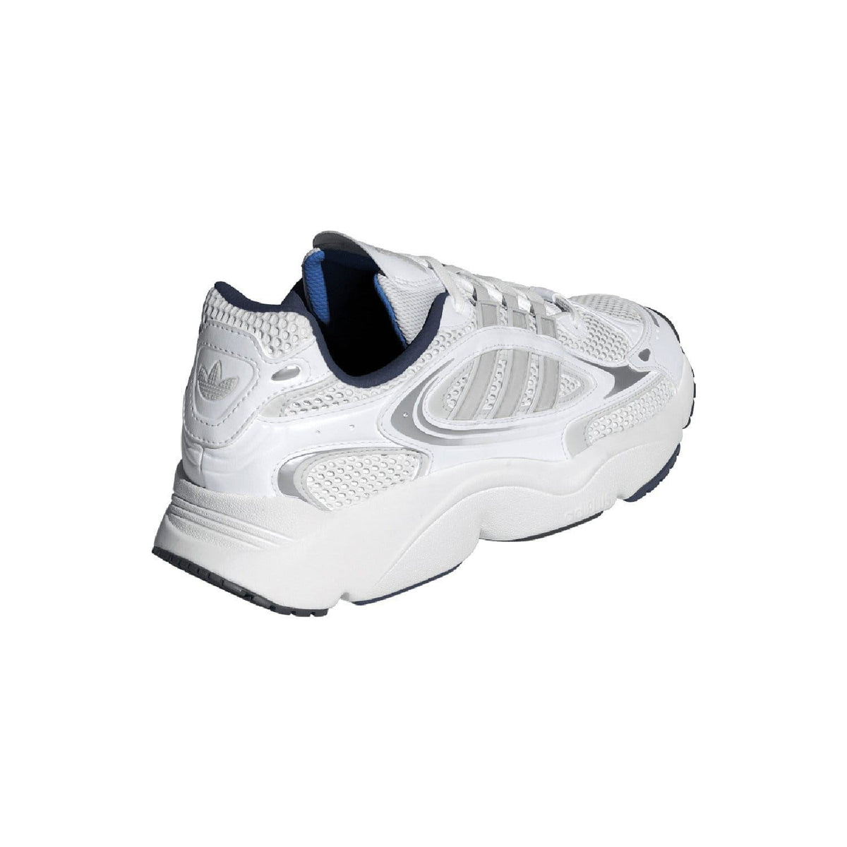 White trainers with navy collar trim, mesh upper, and cushioned heel