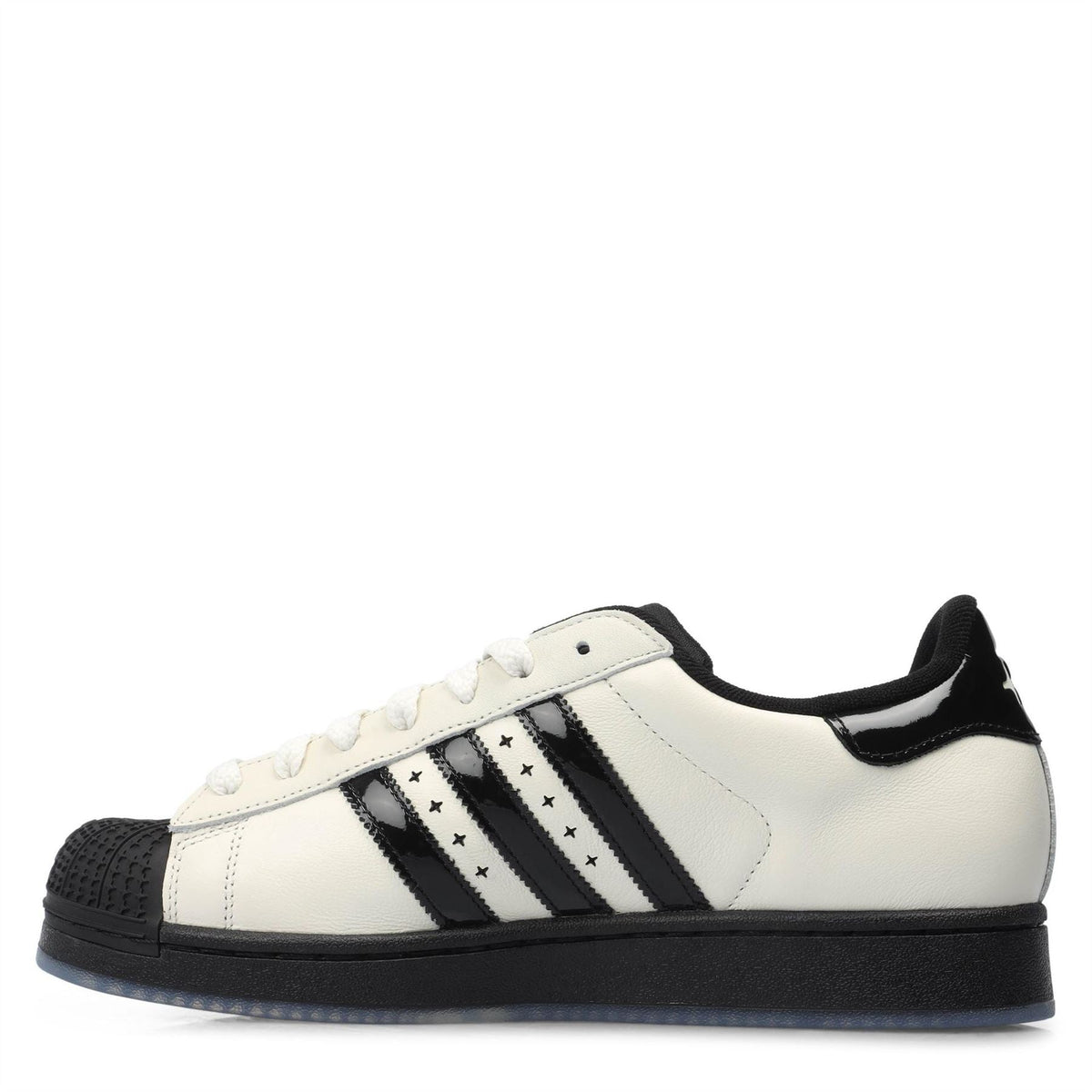 Off-white leather-look low-top sneaker with black triple stripes and black collar trim