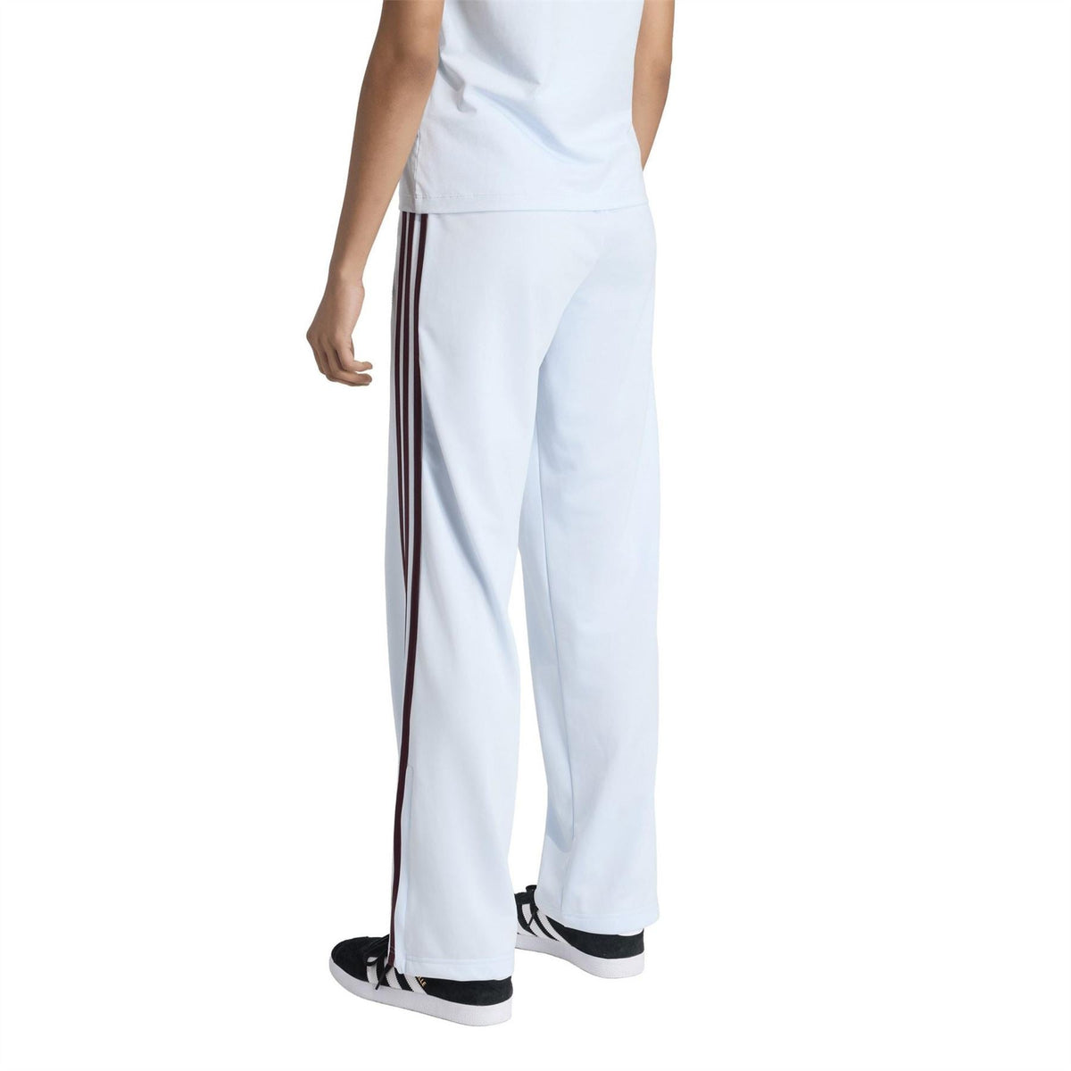 Womens white jogger pants with wide leg, cuffed open hem, dark side stripe panel