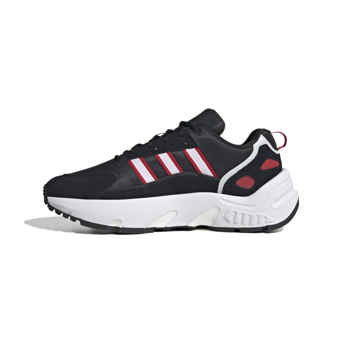 Black ZX 22 Boost trainers with red and white stripes, mesh upper, and white midsole