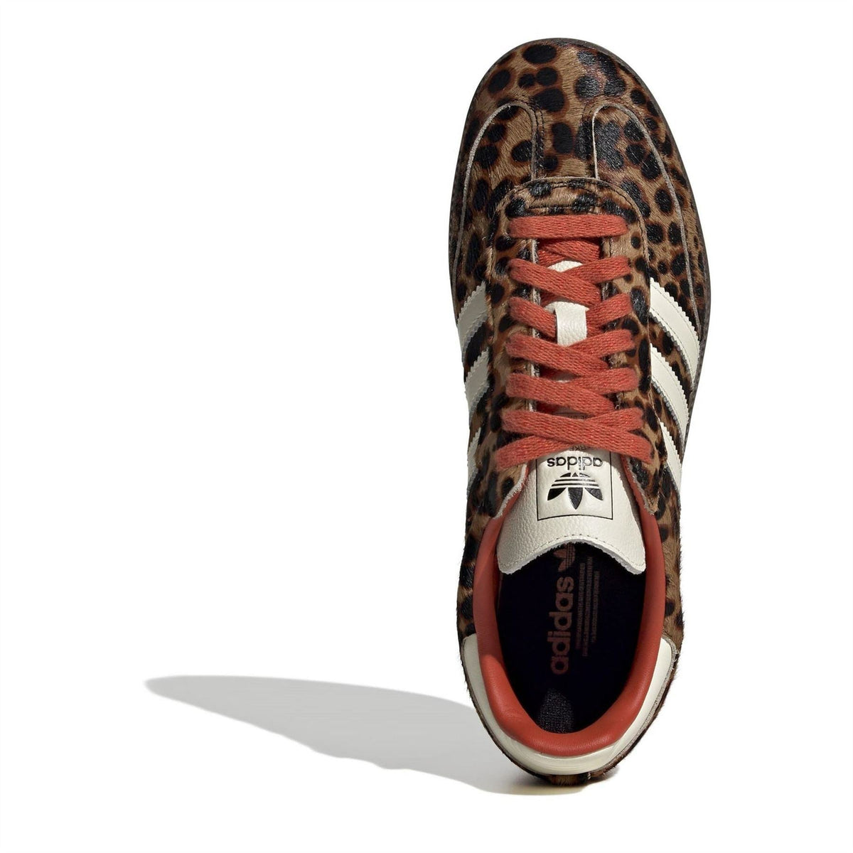 Leopard-print adidas Samba sneakers with lace-up front and adidas logo on tongue
