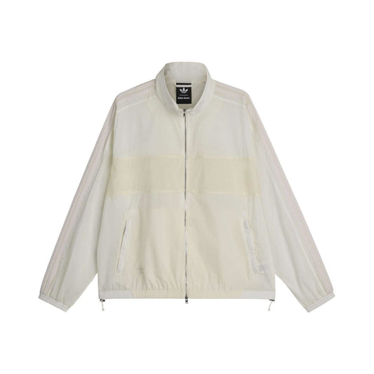 Chalk white track jacket with stand collar, full zip, light paneling, and elastic cuffs.