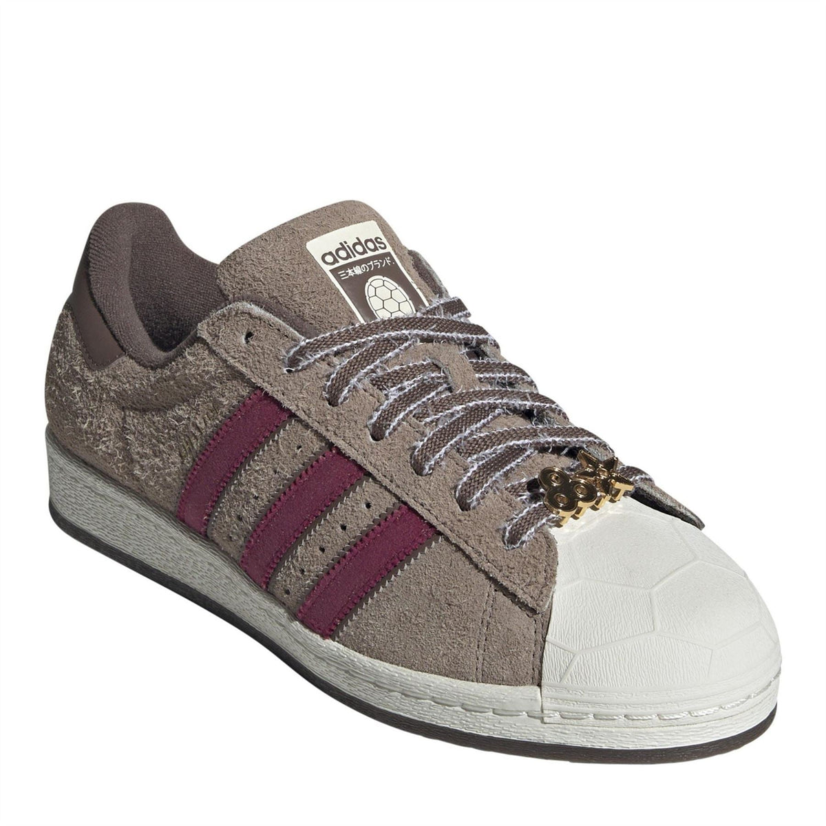 adidas Originals shell-toe sneakers in taupe suede with maroon stripes and lace ornament