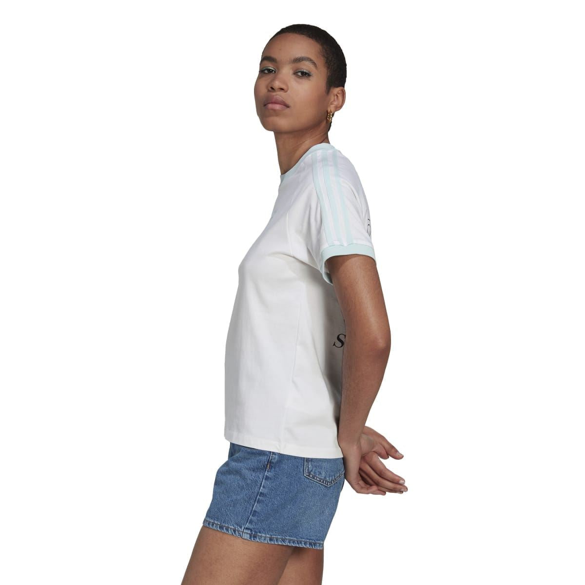 White adidas Originals T-shirt side view with short sleeves and light blue trim