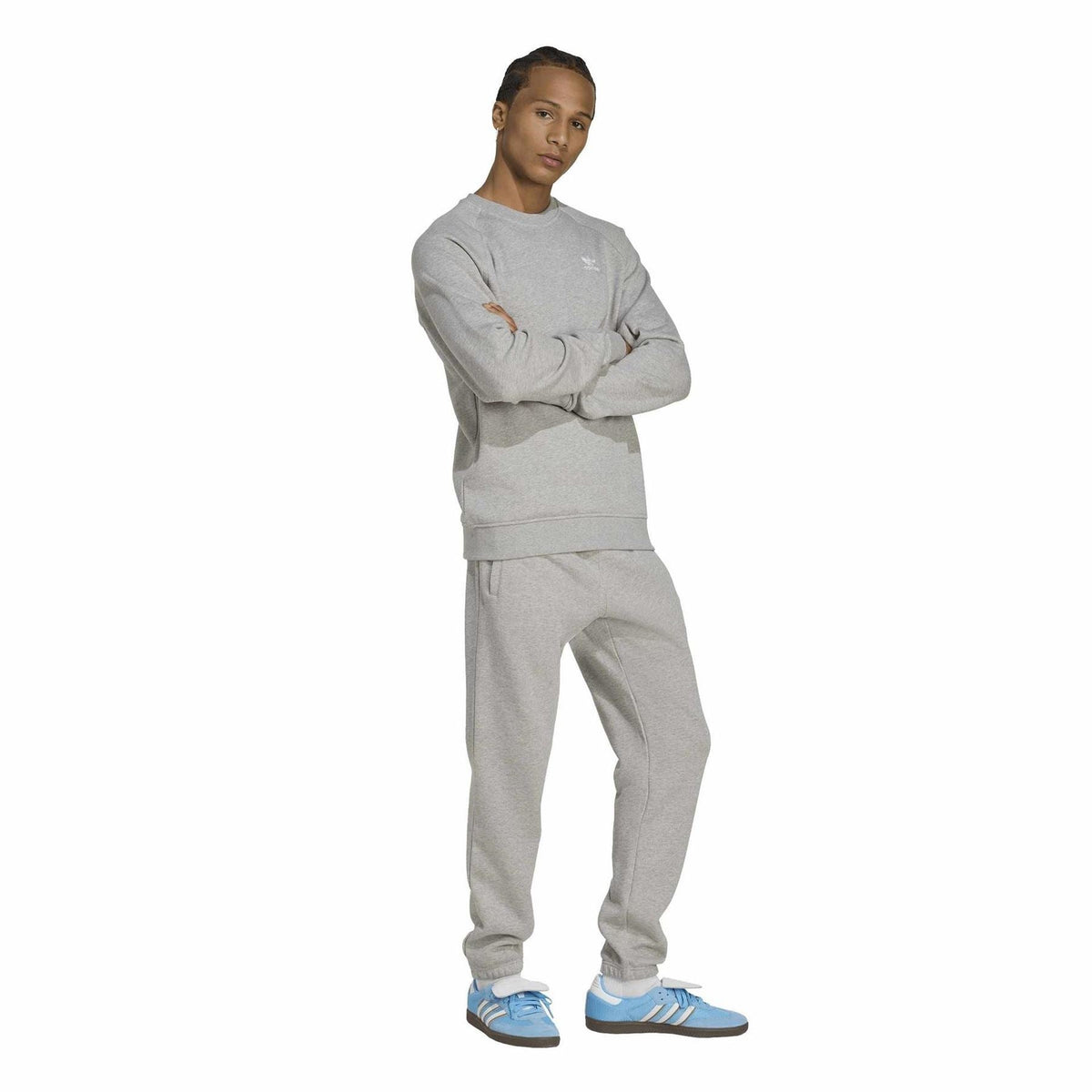Heather grey adidas Originals French terry jogger pants worn with sneakers