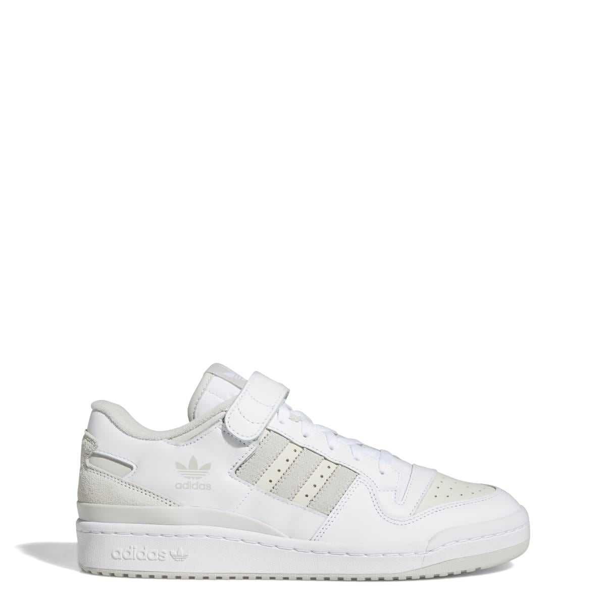 White and grey low-top sneakers with hook-and-loop strap and cushioned midsole