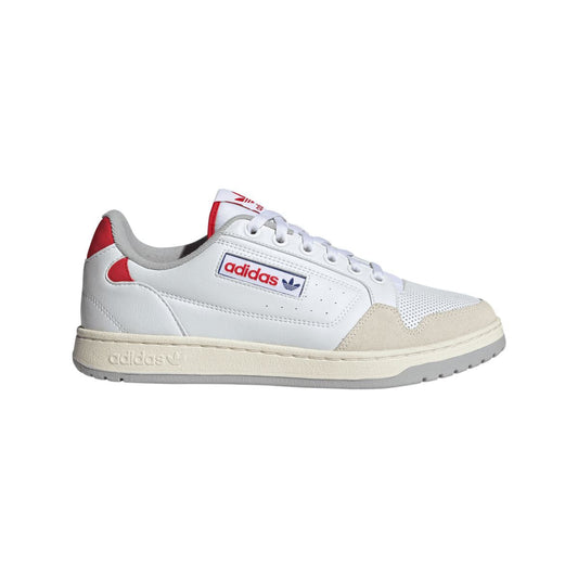White adidas Originals NY 90 trainers with red heel accents and perforated toe