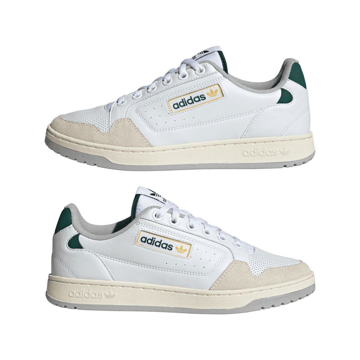 Pair of white adidas NY 90 trainers with green lining, suede panels, and beige sole