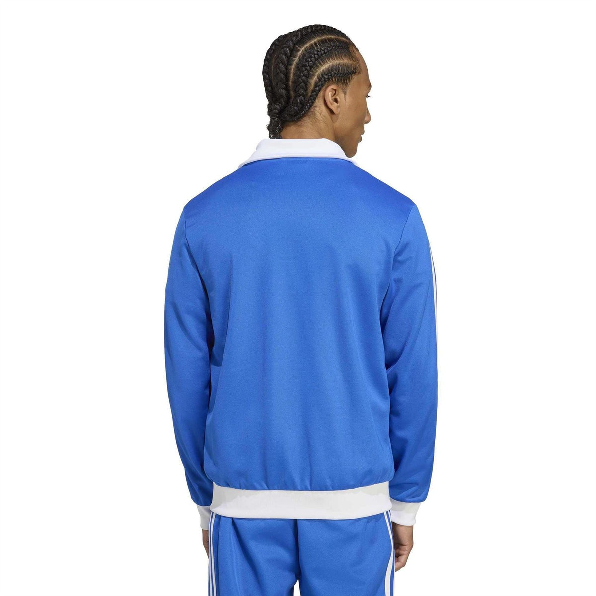 adidas Originals Adicolor Classics track top in vibrant color, shown on hanger with detailed fabric and design features.