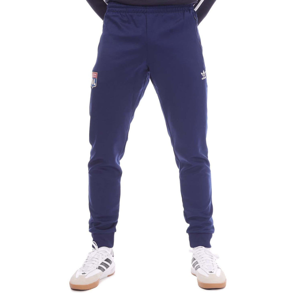 Navy adidas Originals track pants with ribbed cuffs and side branding