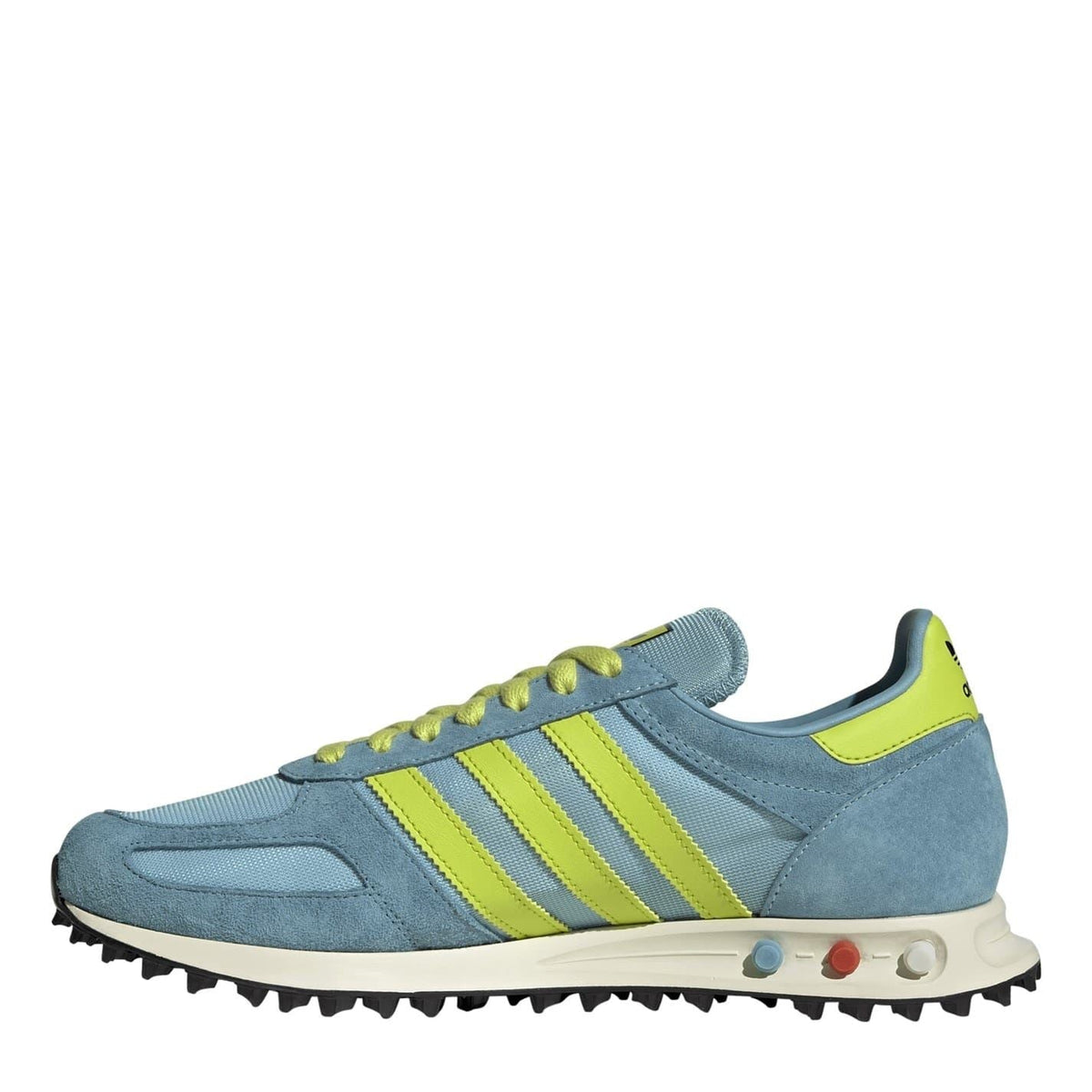 Light blue lace-up sneakers with neon green stripes and yellow laces, black tread sole