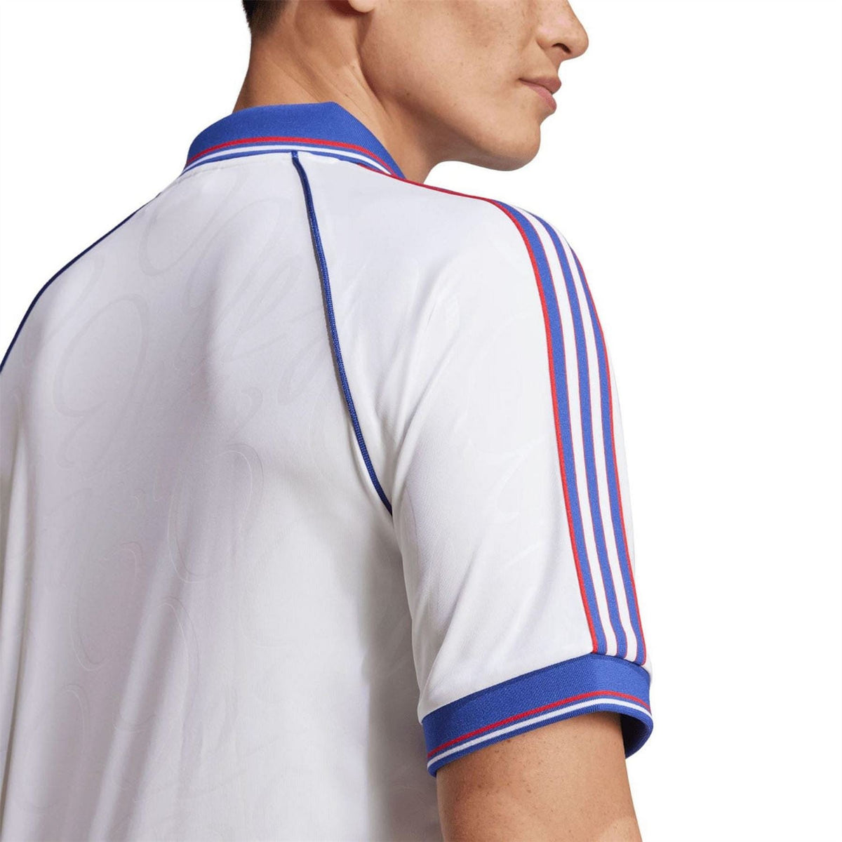 adidas Originals Bellingham Polo Shirt with classic collar and logo embroidery, navy blue color, lightweight cotton fabric