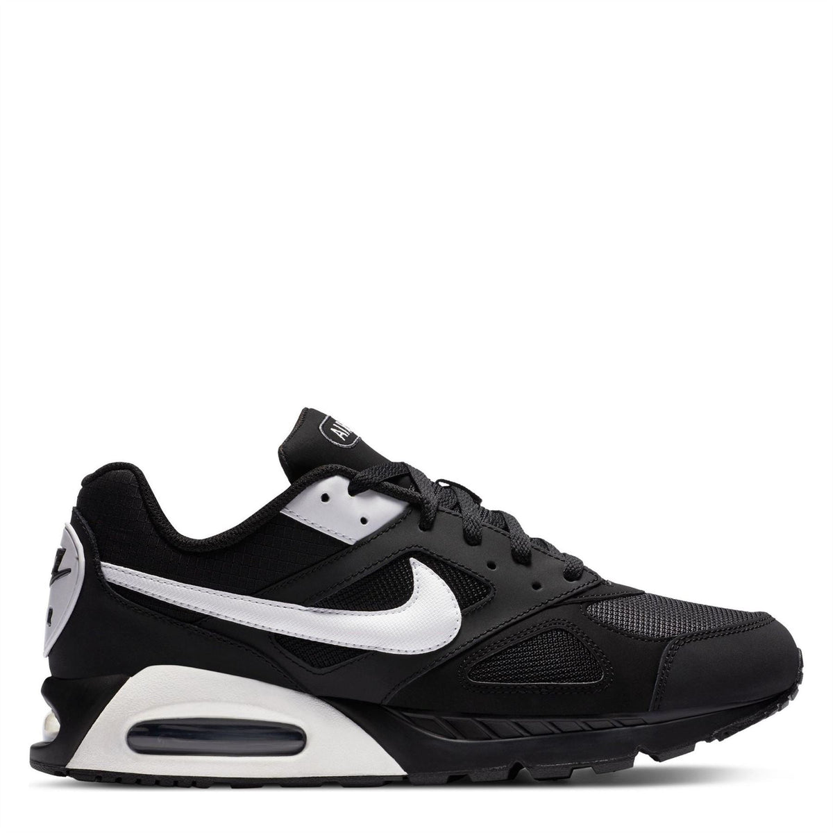 Black low-top trainers with white swoosh and visible air unit midsole