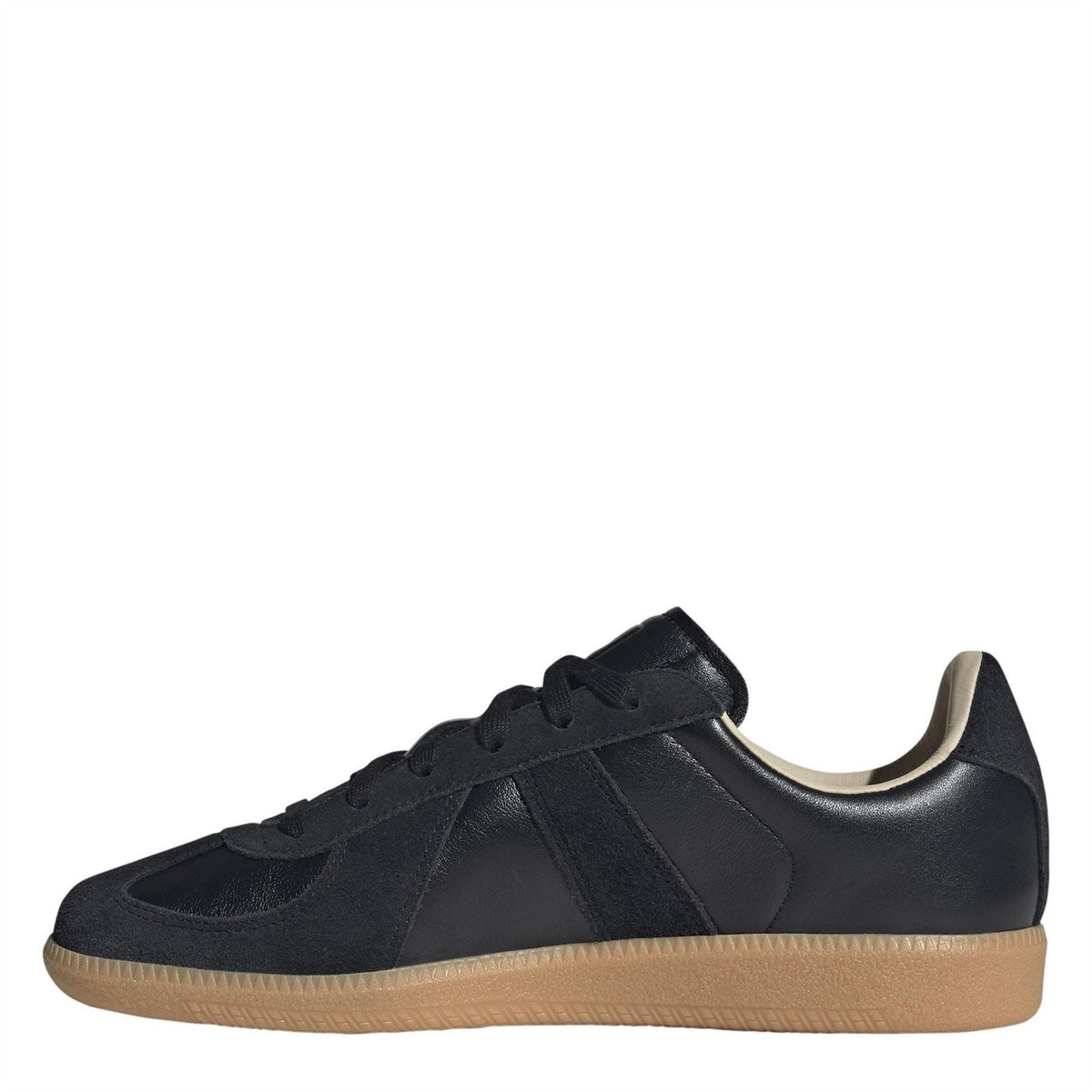 Black adidas Originals low-top sneaker with lace-up closure and tan gum sole