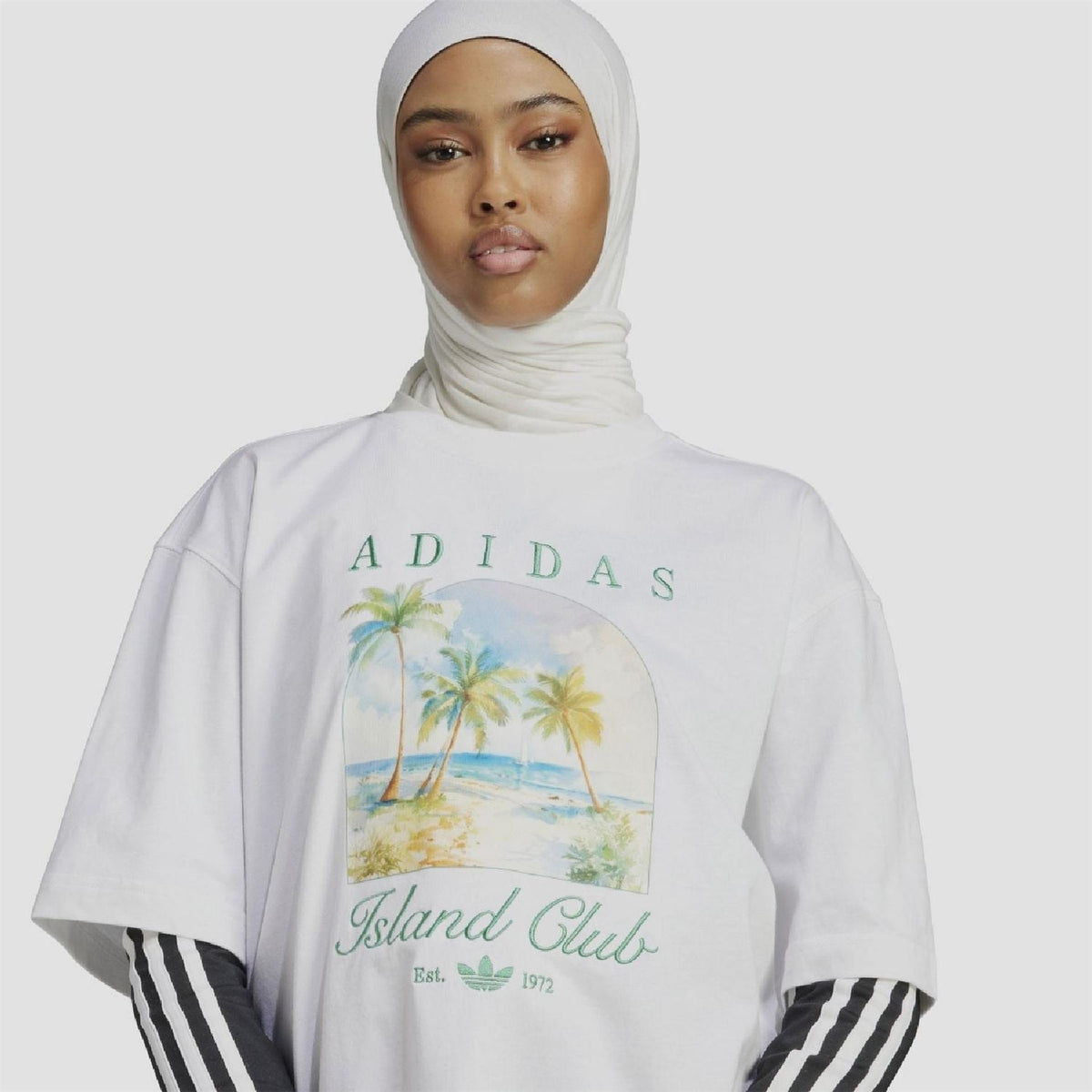 adidas Originals T-shirt, casual tops in white with the classic adidas logo on the front, soft cotton fabric.