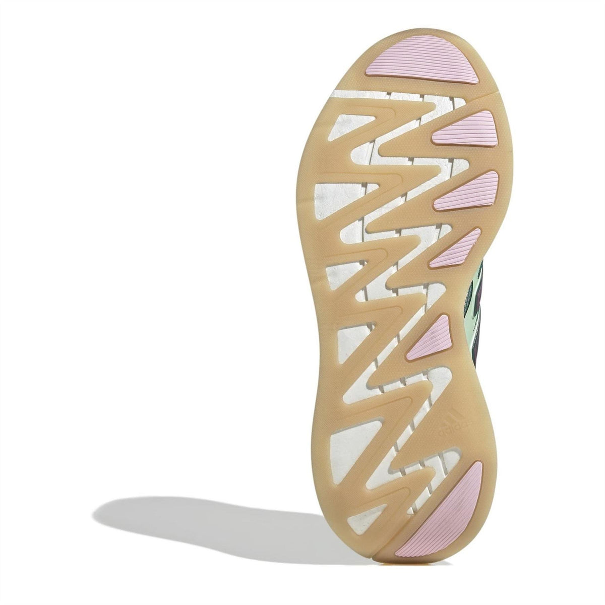 Green and pink low-top sneakers, outsole view with gum-toned tread and striped panels