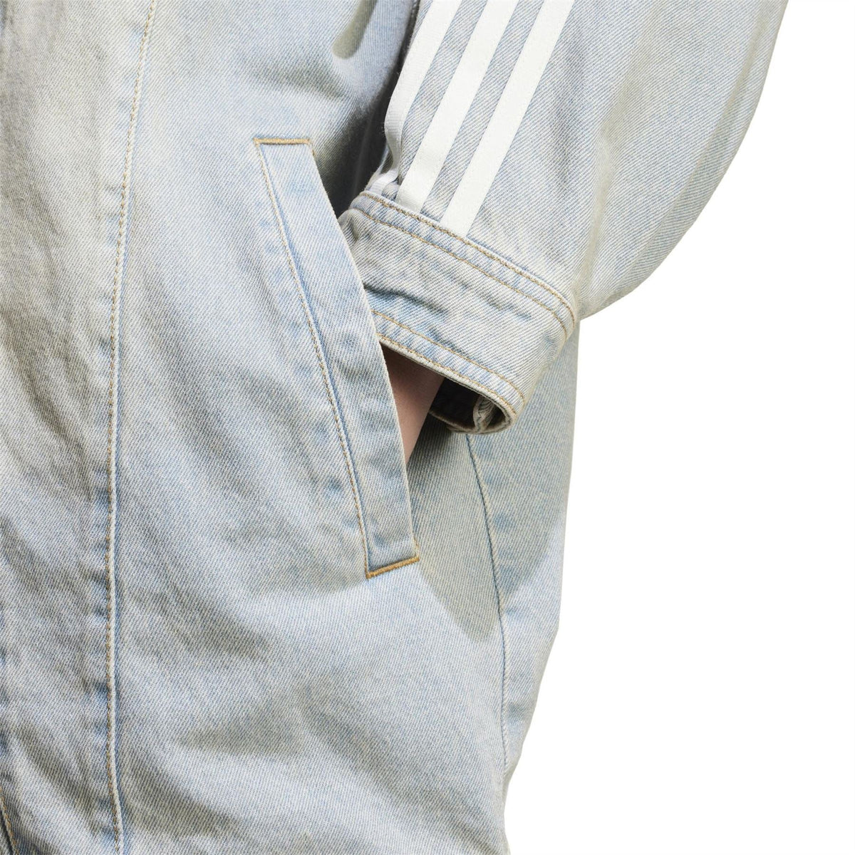 adidas Originals light denim jacket cuff detail with vertical stripe panel and button closure