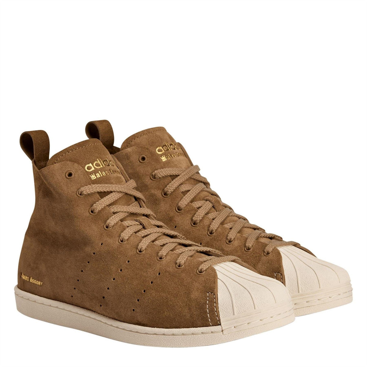 Pair of brown suede high-top sneakers with cream side stripes and lace-up