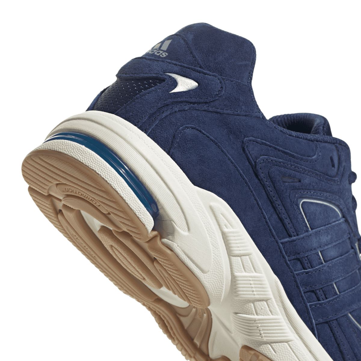 Navy adidas Response CL sneaker outsole view with white midsole and tan tread