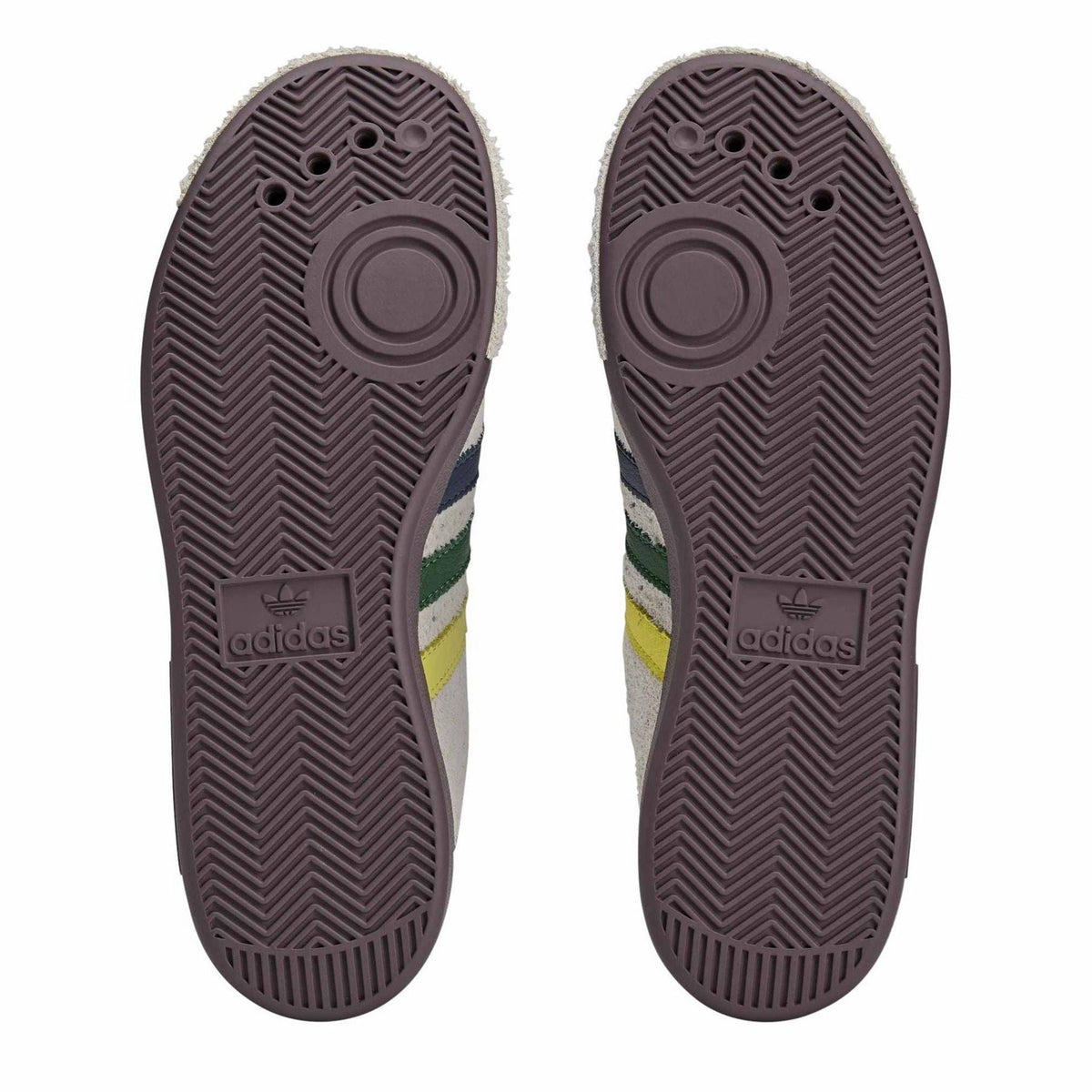 Rubber outsole soles with Adidas logo and herringbone tread, dark purple finish