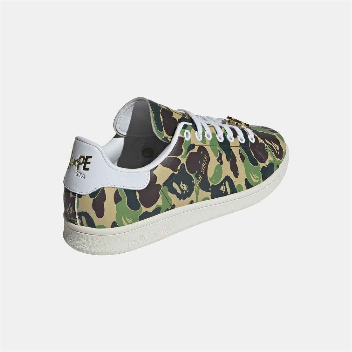 Stan Smith sneaker side and heel, green/brown camo upper with white paneling and light sole