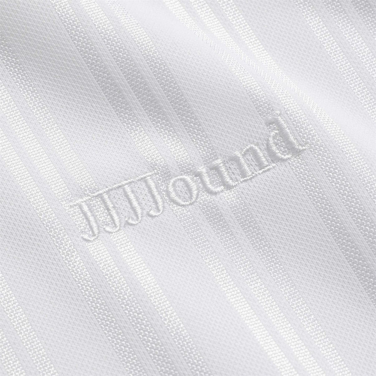 White jersey fabric with raised JJJJound lettering detail