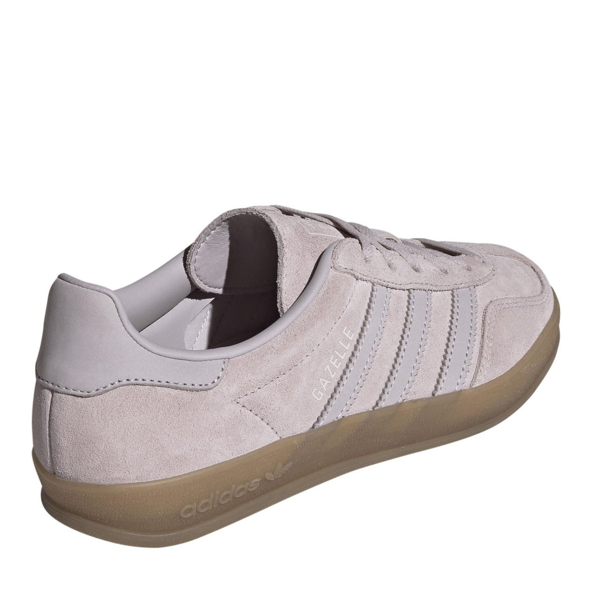 Light suede low-top trainers with lace-up design, adidas stripes, and gum sole.