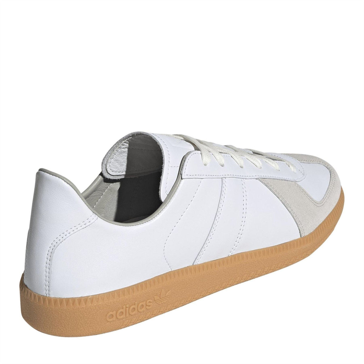 White and gray lace-up trainers with padded collar and gum rubber outsole