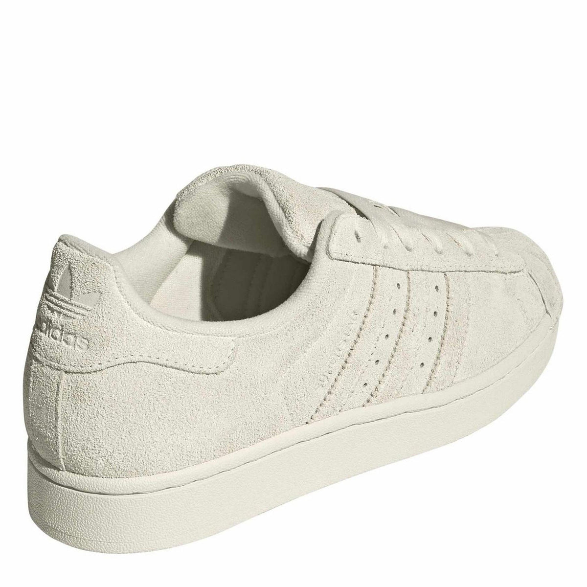Light cream suede low-top sneakers, heel and side profile with three stripes