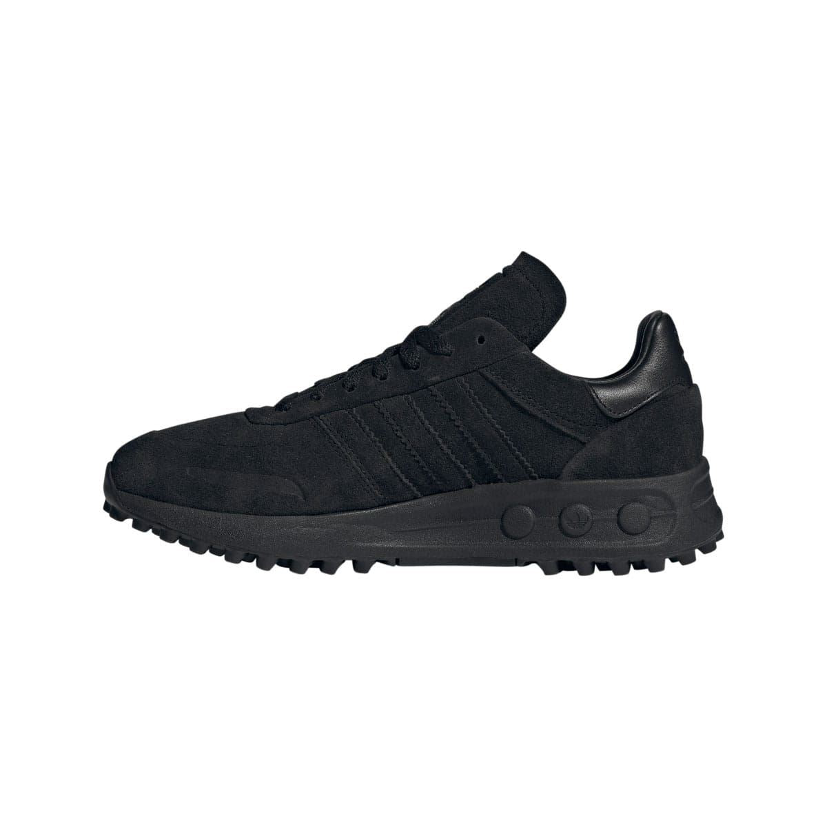 adidas Originals LA Trainer XLG sneakers showing side view with white and gray color scheme and textured sole.