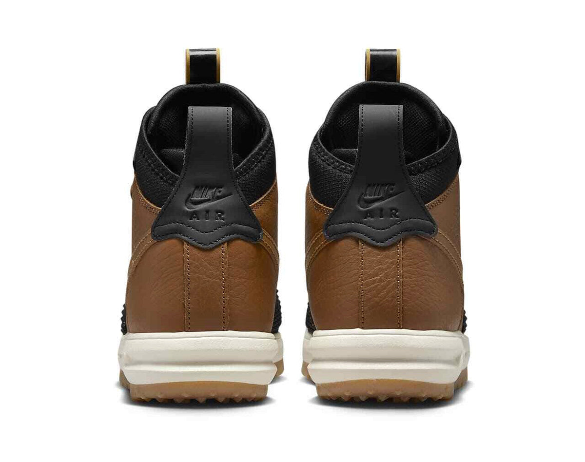 Men's Nike duckboot heel view in ale brown and black with cushioned back panel