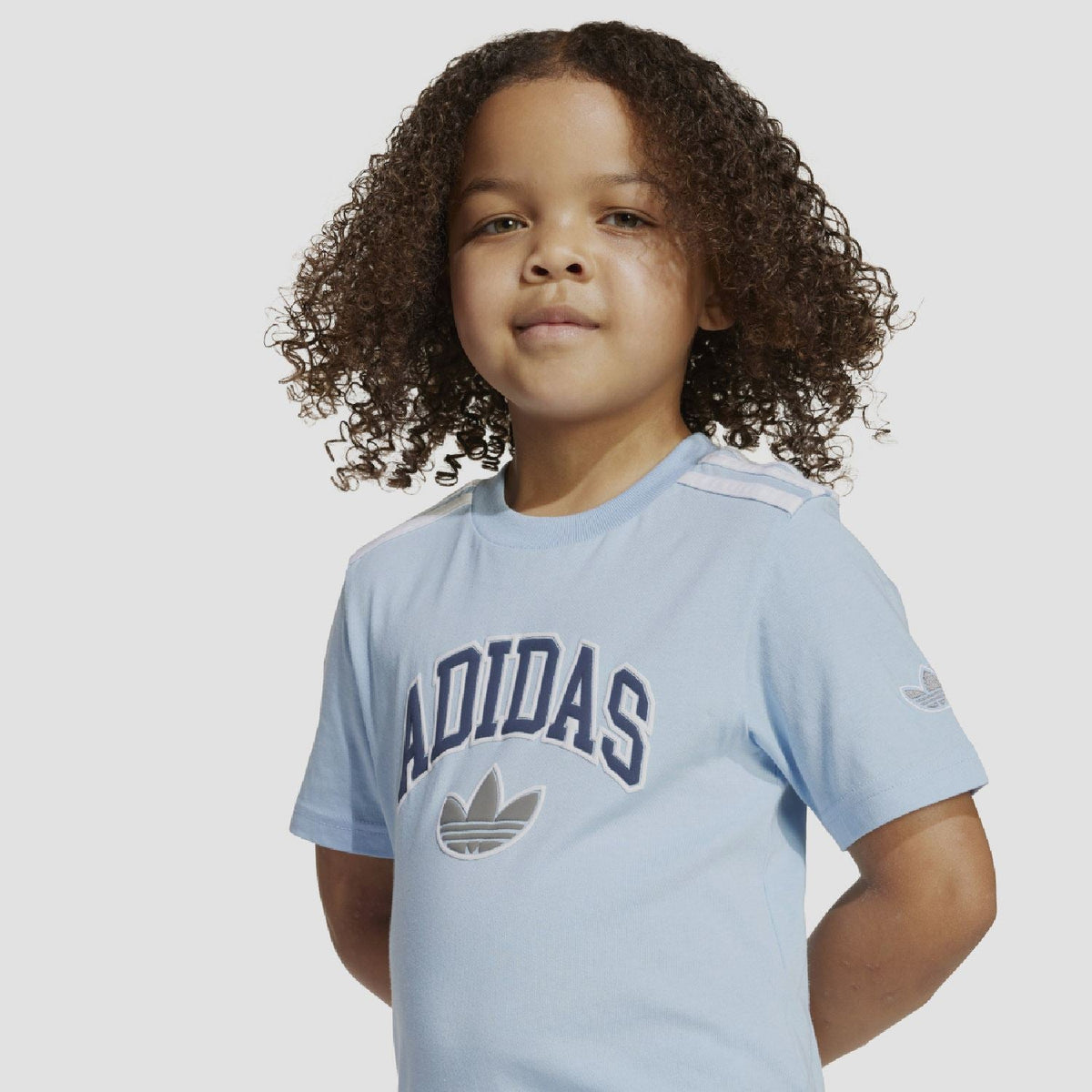 adidas Originals juniors T-shirt and shorts set for kids aged 8-16, featuring the brand's logo and casual athletic style