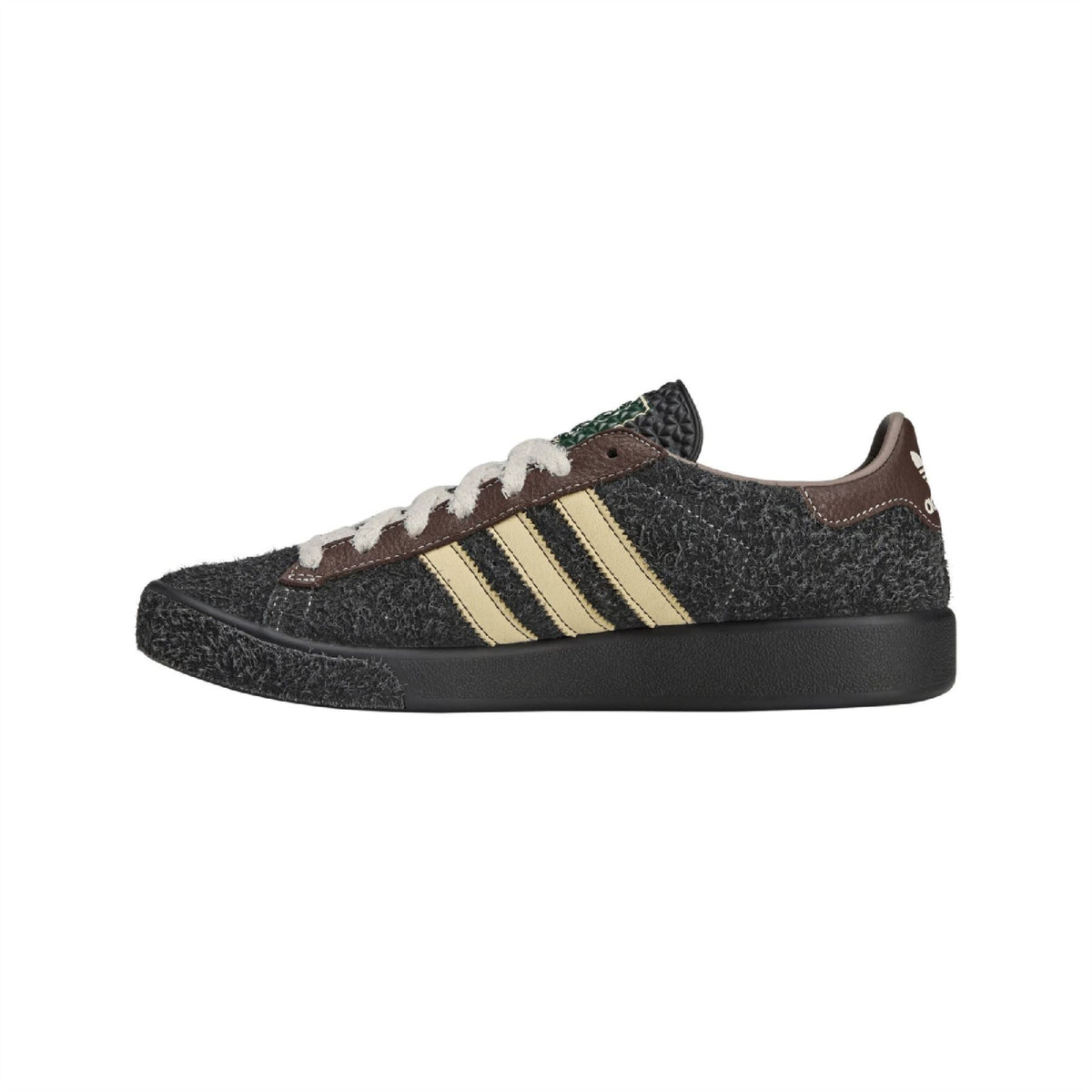 adidas Originals Forest Hills Brain Dead sneakers showing black and white canvas footwear with classic low-top design
