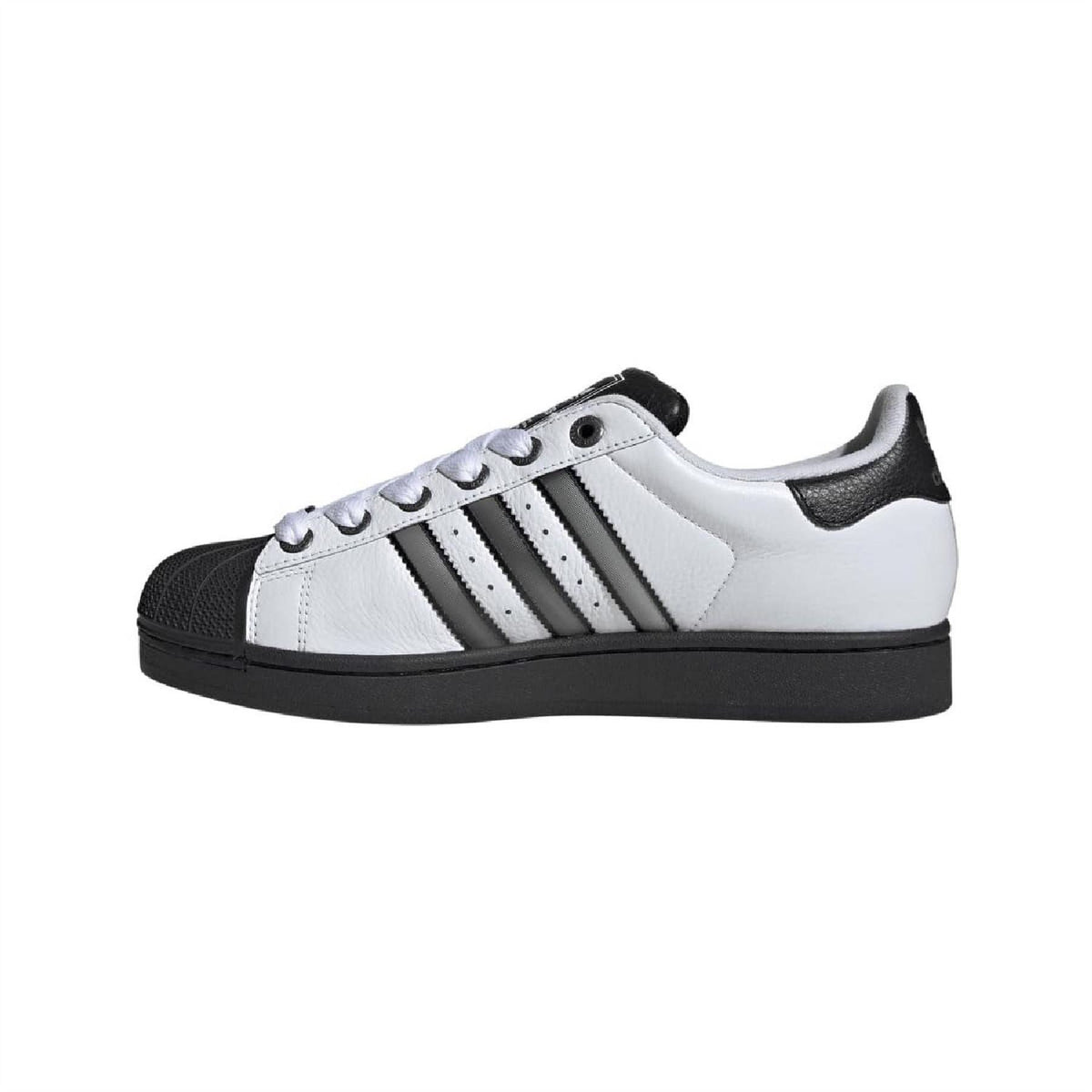 White leather low-top sneakers with black three stripes and lace-up eyelets