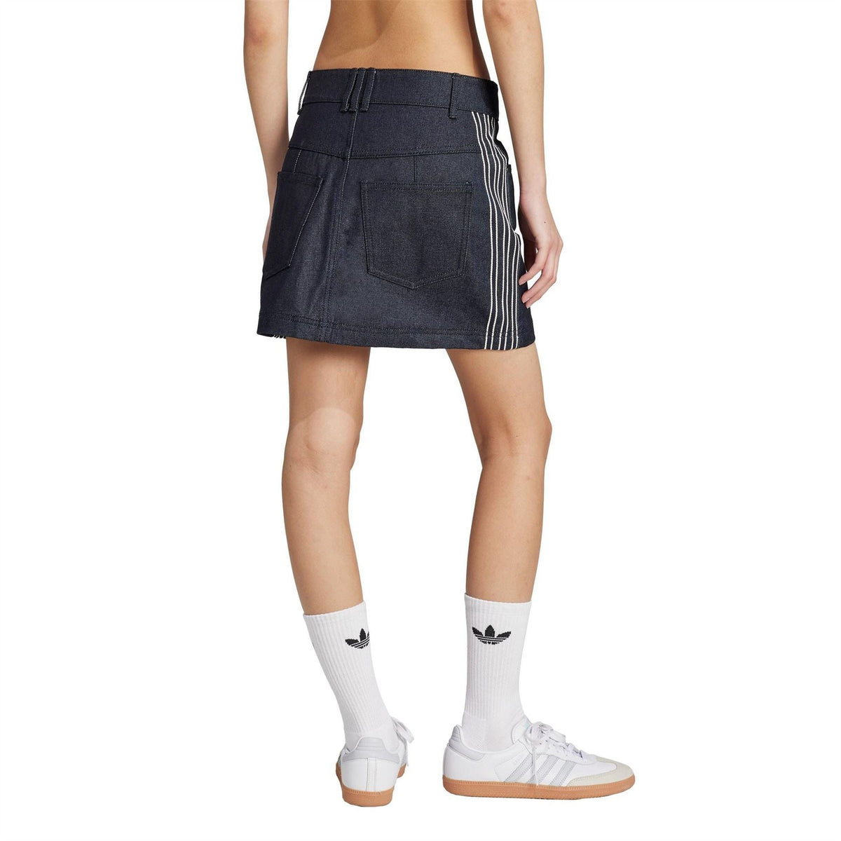 adidas Originals indigo denim skirt on model, front view with belt loops