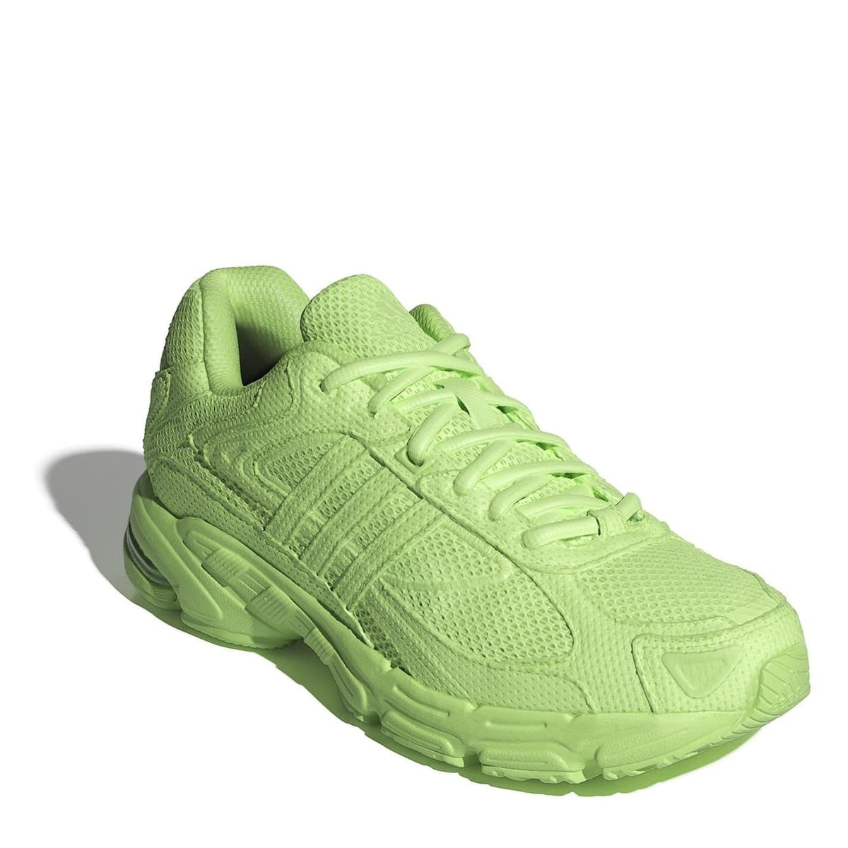 adidas Originals lace-up sneakers in neon green, angled side view with cushioned sole