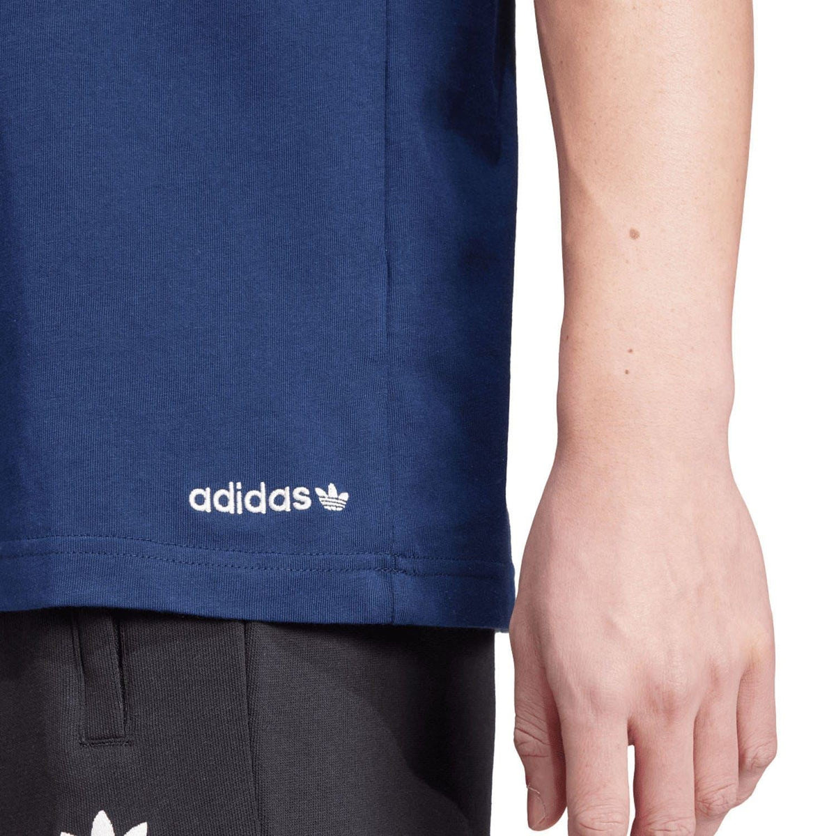 Indigo adidas Originals graphic T-shirt hem with adidas Trefoil label