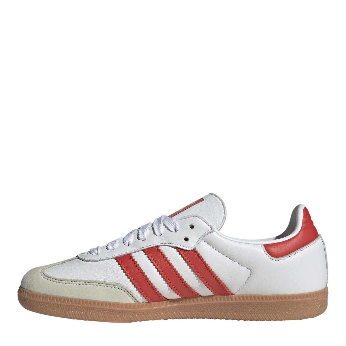 White low-top sneakers with red adidas stripes, lace-up front, gum sole