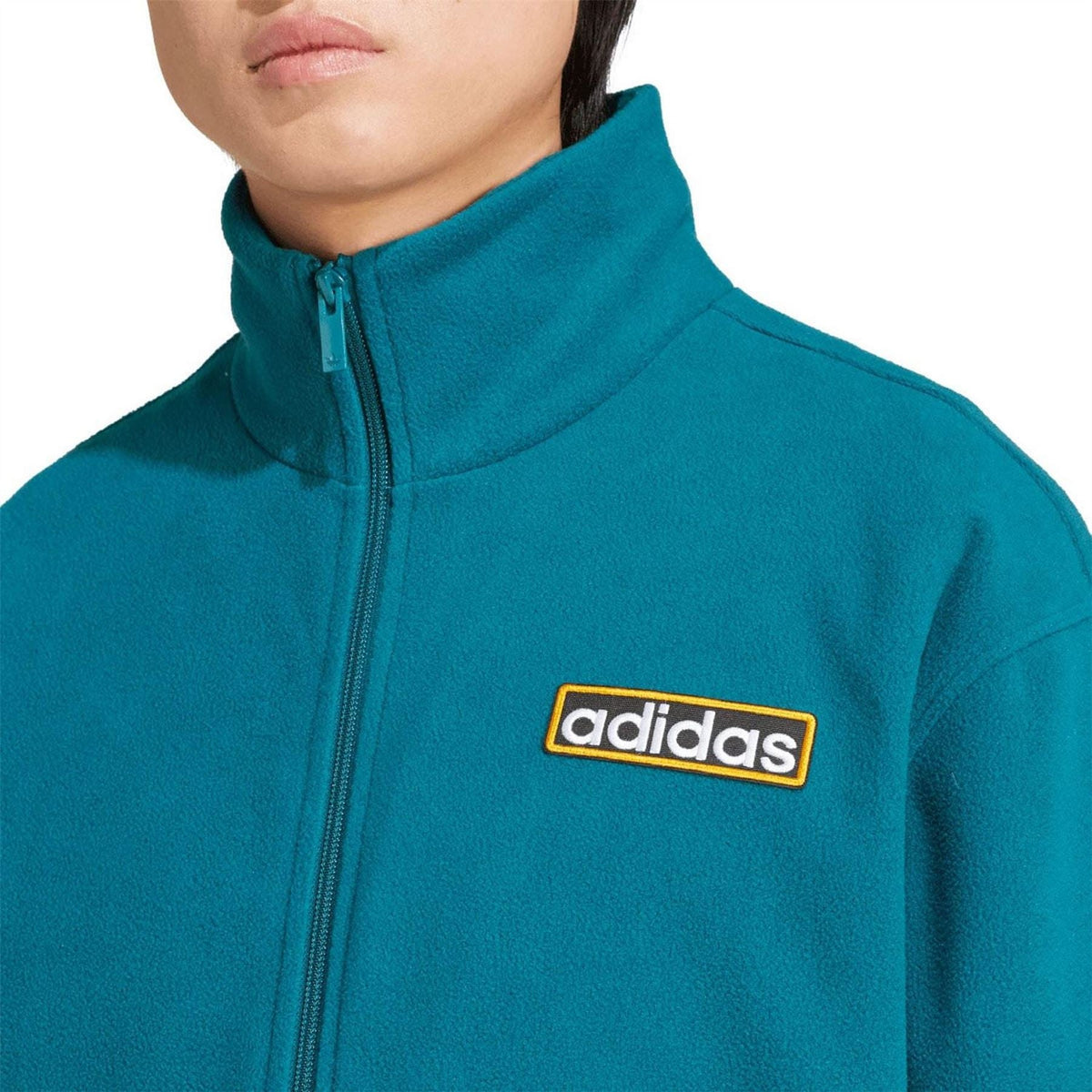 Teal fleece track jacket with stand collar zip and adidas logo patch